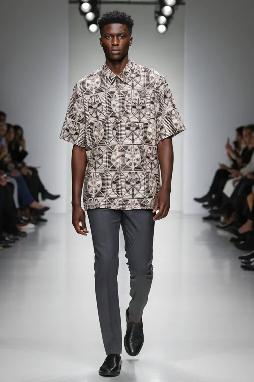 Strength African print oversized shirt with charcoal trousers
